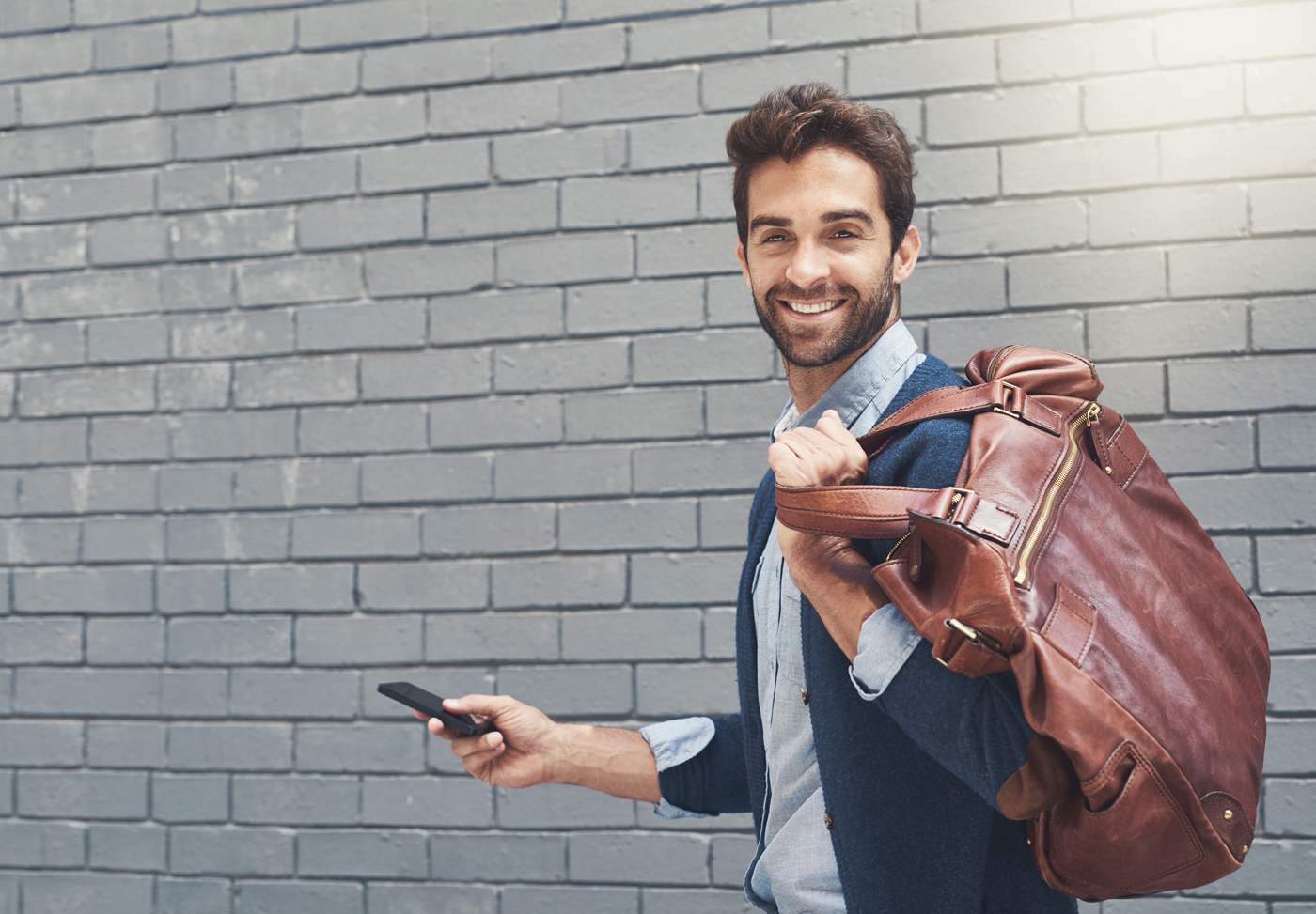man-with-brown-bag-leather man-with-brown-bag-leather